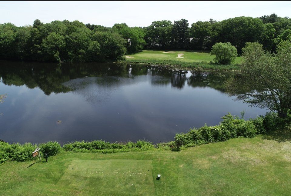 Rainbow Pond seen from the tee, with the green on the far shore