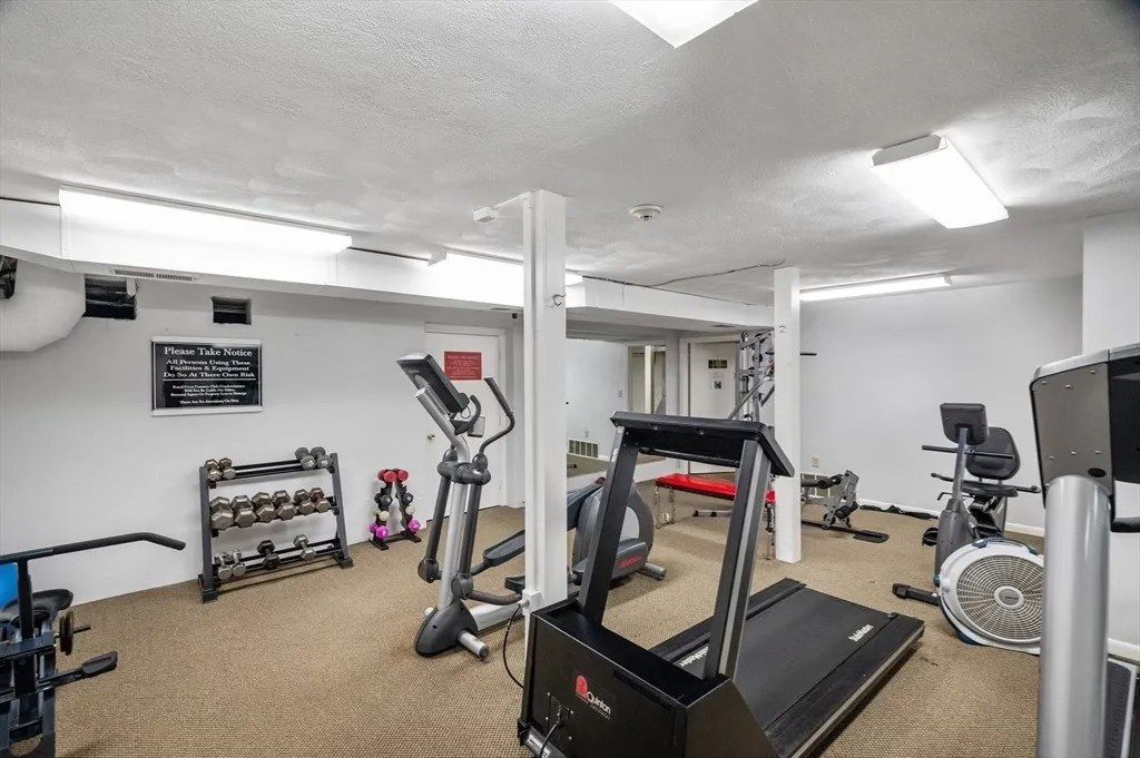 The Royal Crest exercise room with cardio and strength-training equipment