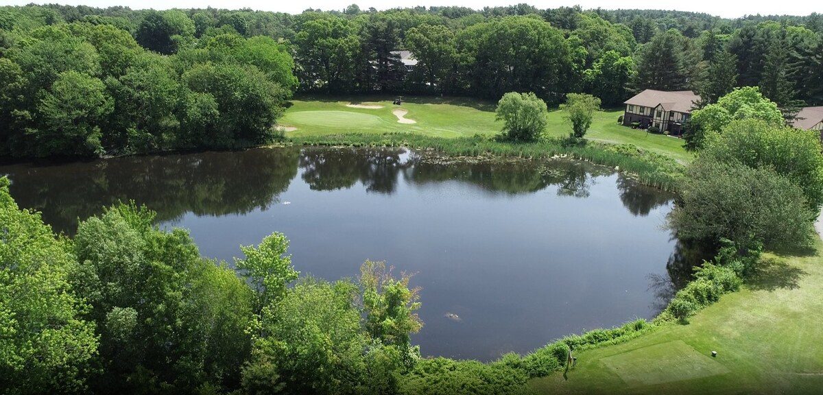 Rainbow Pond seen from above, alongside the ninth hole